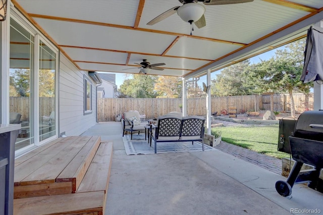 view of patio with outdoor lounge area, ceiling fan, and area for grilling