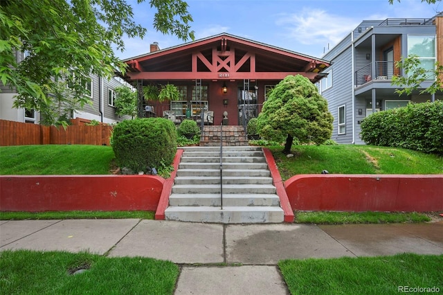 2131 Eliot St, Denver, CO 80211 - view of property with stairway