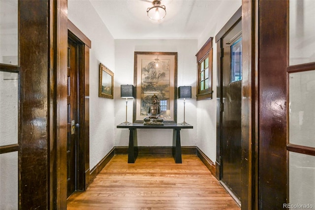 2131 Eliot St, Denver, CO 80211 - corridor featuring hardwood / wood-style floors and baseboards