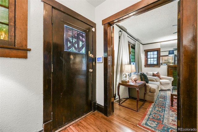 2131 Eliot St, Denver, CO 80211 - foyer entrance featuring wood finished floors