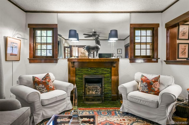2131 Eliot St, Denver, CO 80211 - living area with a brick fireplace, plenty of natural light, crown molding, and ceiling fan
