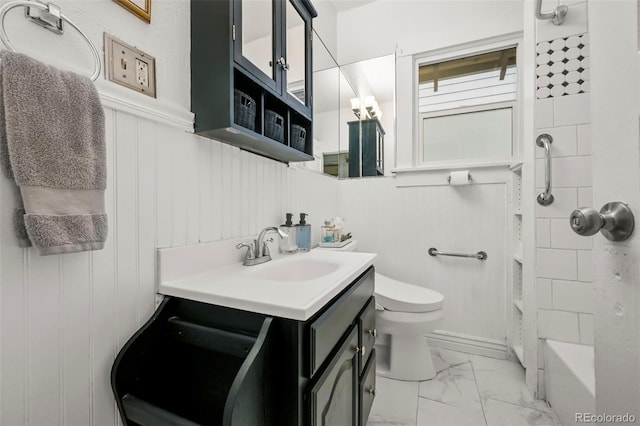 2131 Eliot St, Denver, CO 80211 - full bath with marble finish flooring, vanity, toilet, shower / tub combination, and a decorative wall