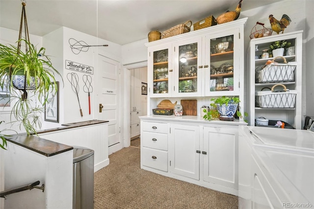 2131 Eliot St, Denver, CO 80211 - interior space featuring light carpet and separate washer and dryer