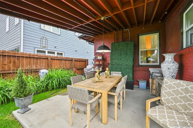 2131 Eliot St, Denver, CO 80211 - fenced backyard featuring a patio area and outdoor dining area