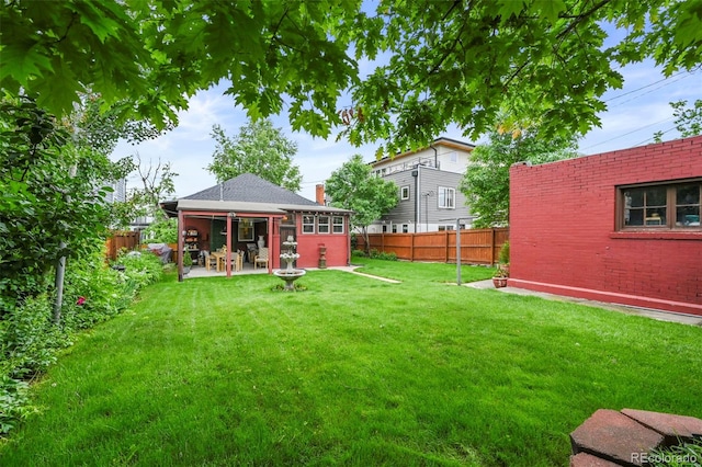 2131 Eliot St, Denver, CO 80211 - view of yard with a patio area and an outdoor structure
