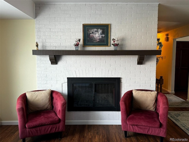 room details featuring a fireplace and hardwood / wood-style floors