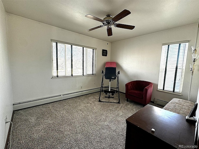 sitting room featuring ceiling fan and a baseboard radiator