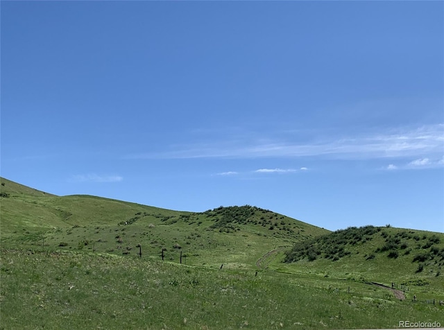 mountain view with a rural view