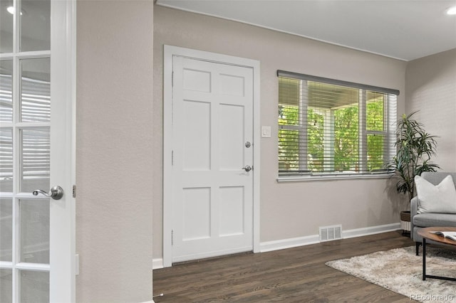 1120 S Harrison St, Denver, CO 80210 - entryway with wood finished floors and baseboards