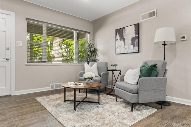 1120 S Harrison St, Denver, CO 80210 - sitting room with wood finished floors and baseboards