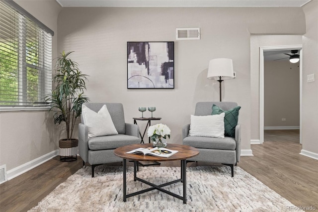 1120 S Harrison St, Denver, CO 80210 - living area with wood finished floors and a ceiling fan