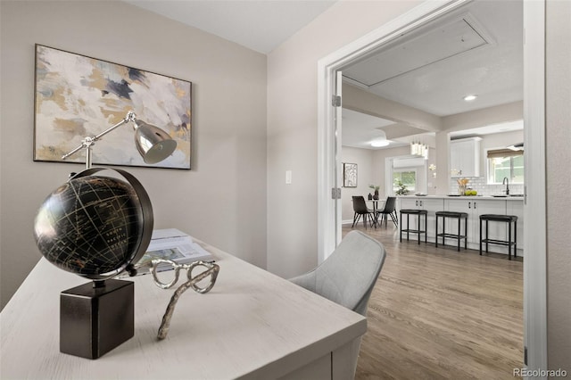 1120 S Harrison St, Denver, CO 80210 - office area featuring attic access and wood finished floors