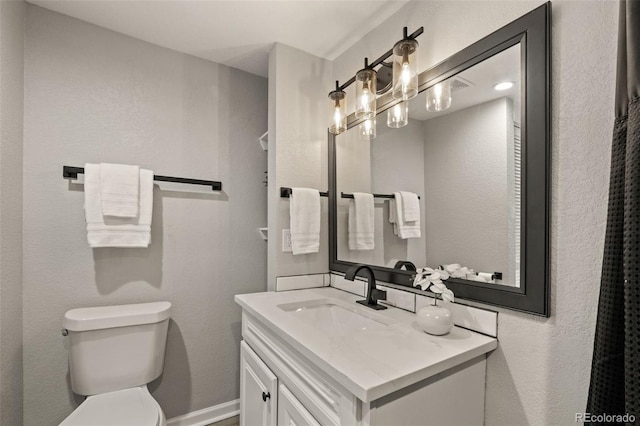 1120 S Harrison St, Denver, CO 80210 - bathroom with vanity and toilet