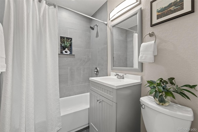 1120 S Harrison St, Denver, CO 80210 - bathroom with shower / bath combo with shower curtain, vanity, and a textured wall