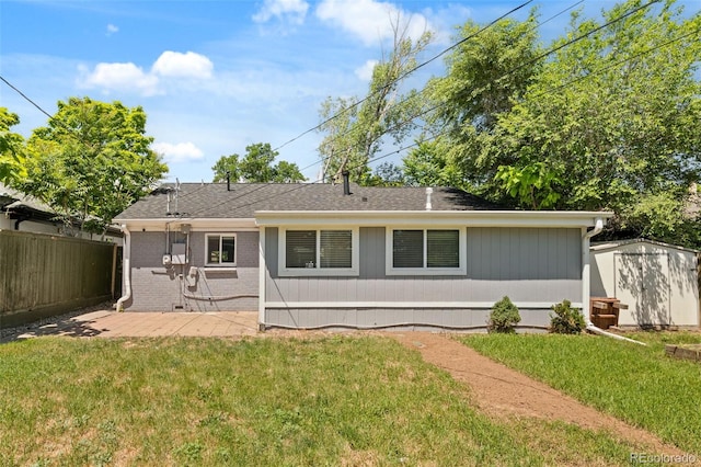 1120 S Harrison St, Denver, CO 80210 - rear view of property with a patio area, a storage shed, and brick siding