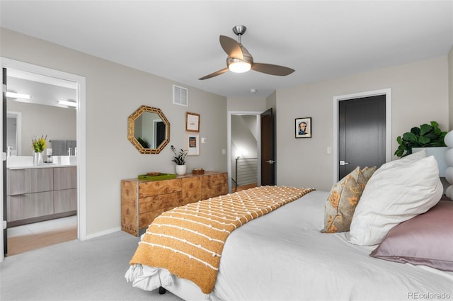 3885 Vrain St, Denver, CO 80212 - bedroom with light carpet, ceiling fan, ensuite bathroom, and baseboards
