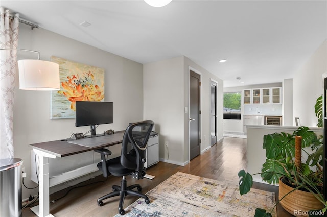 3885 Vrain St, Denver, CO 80212 - office area featuring wood finished floors, beverage cooler, recessed lighting, and baseboards