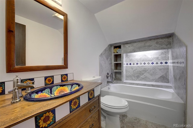 bathroom with shower / bathtub combination, vanity, and toilet