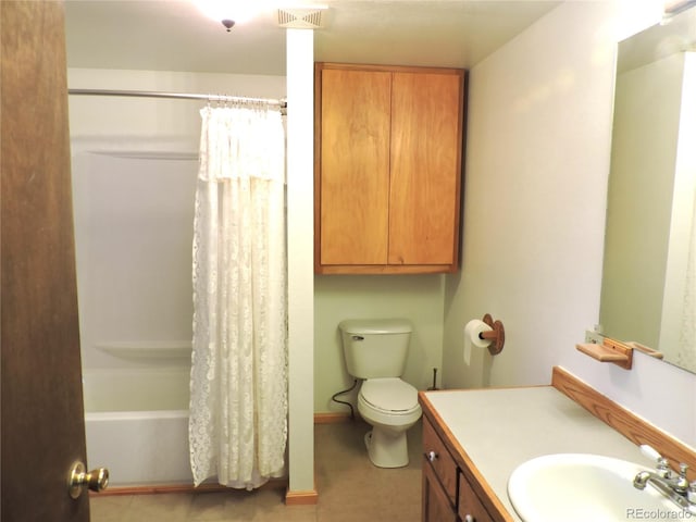 full bathroom with vanity, toilet, and shower / tub combo with curtain