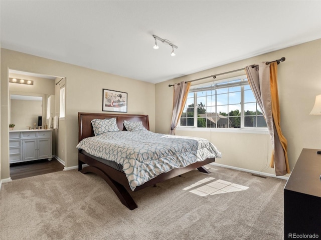 18554 E Vassar Dr, Aurora, CO 80013 - carpeted bedroom featuring baseboards