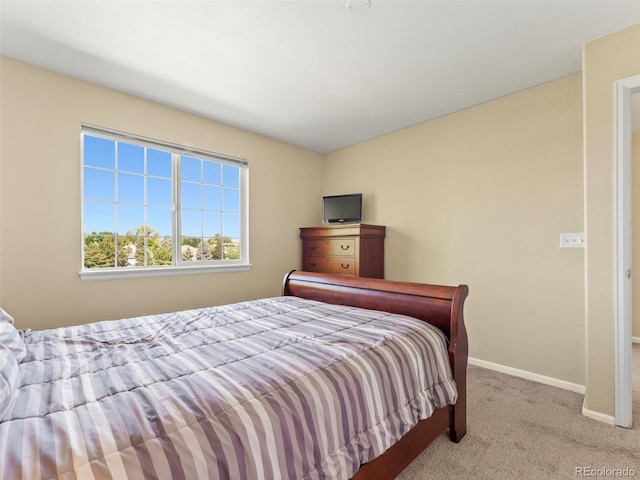 18554 E Vassar Dr, Aurora, CO 80013 - bedroom featuring carpet floors and baseboards