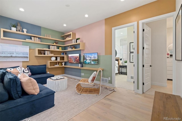 living room with light hardwood / wood-style floors