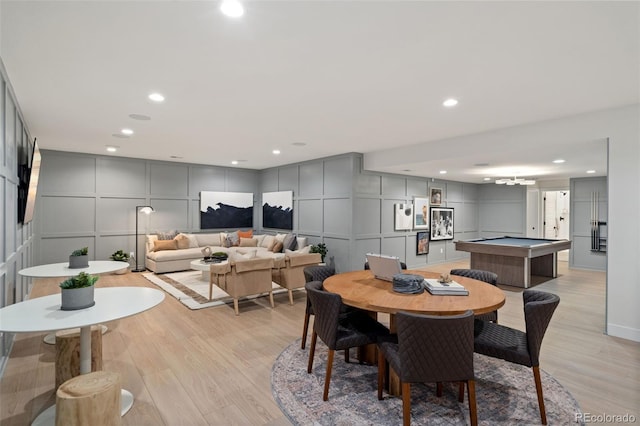 dining space featuring light wood-type flooring