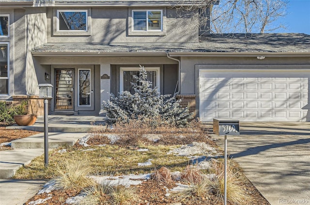 view of exterior entry featuring a garage