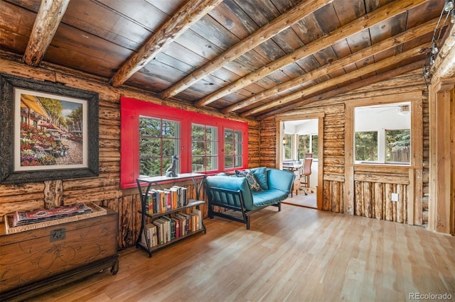 5732 Santa Clara Rd, Indian Hills, CO 80454 - sitting room featuring wood finished floors, wood ceiling, and rustic walls