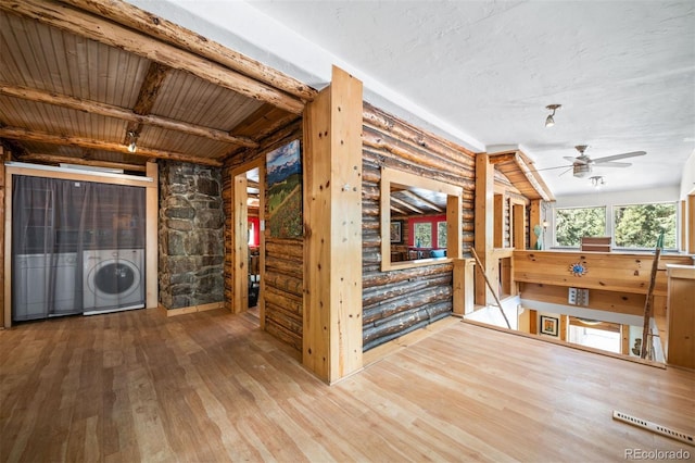 5732 Santa Clara Rd, Indian Hills, CO 80454 - interior space featuring washer / dryer and hardwood / wood-style flooring
