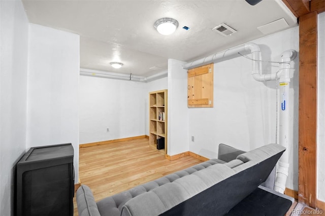 5732 Santa Clara Rd, Indian Hills, CO 80454 - living room featuring wood finished floors and baseboards