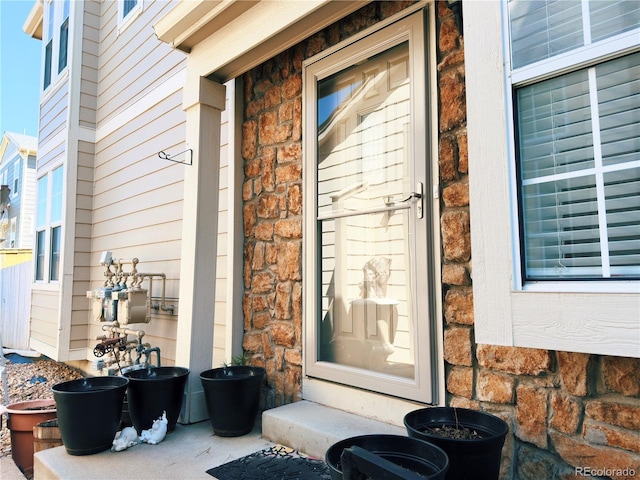 1120 S Waco St Unit A, Aurora, CO 80017 - property entrance with stone siding