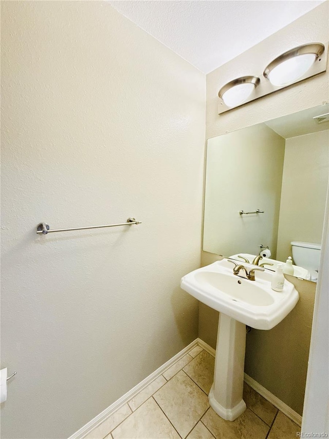1120 S Waco St Unit A, Aurora, CO 80017 - bathroom with tile patterned floors