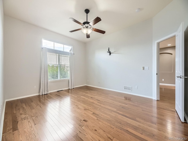 581 N Flat Rock Cir, Aurora, CO 80018 - unfurnished room featuring ceiling fan and light wood-type flooring