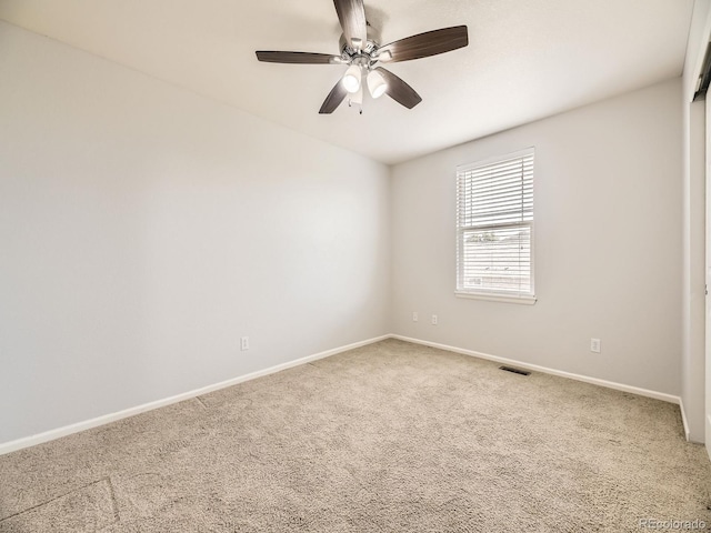 581 N Flat Rock Cir, Aurora, CO 80018 - carpeted empty room with baseboards and ceiling fan