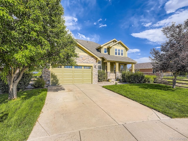 581 N Flat Rock Cir, Aurora, CO 80018 - craftsman house with stone siding, a porch, a front yard, a garage, and concrete driveway