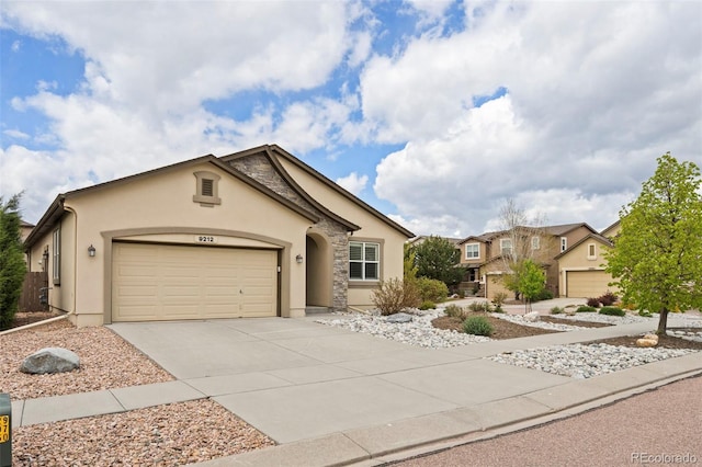 view of front of property featuring a garage