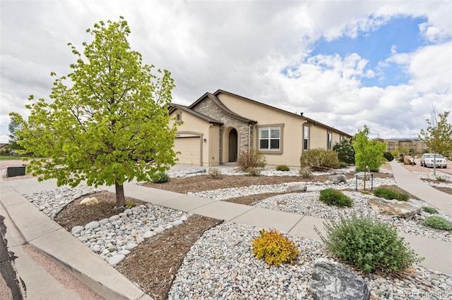 single story home featuring a garage