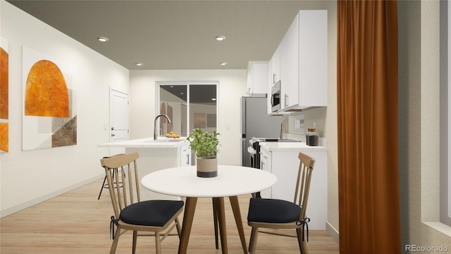 46517 Sunflower Ln, Bennett, CO 80102 - dining space featuring recessed lighting, light wood-style flooring, and baseboards
