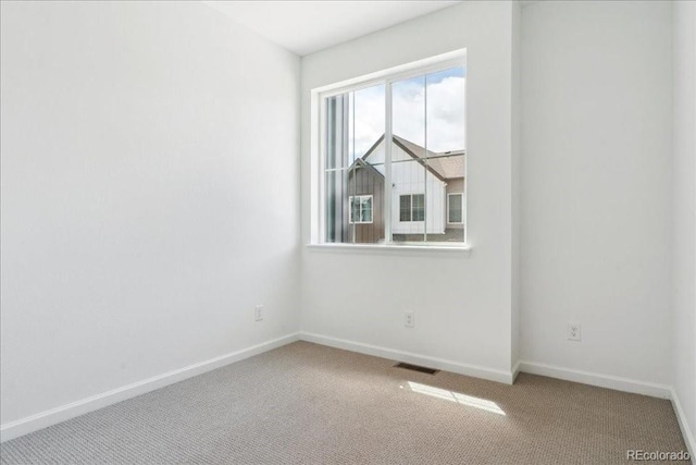 6902 Huddersfield Ln, Castle Pines, CO 80108 - carpeted spare room with baseboards