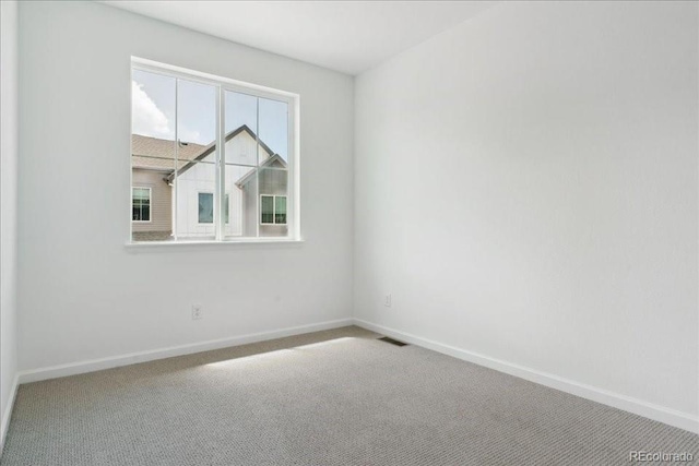 6902 Huddersfield Ln, Castle Pines, CO 80108 - empty room with baseboards and carpet