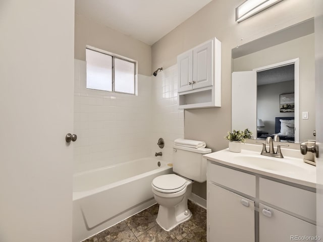 1932 S Oswego Way, Aurora, CO 80014 - ensuite bathroom with toilet, baseboards, vanity, and bathtub / shower combination