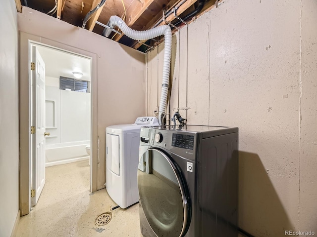 1932 S Oswego Way, Aurora, CO 80014 - clothes washing area featuring washer and clothes dryer