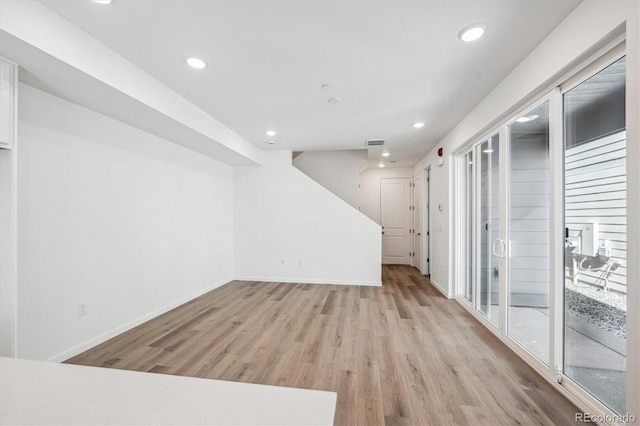 1368 Penner Dr, Erie, CO 80026 - unfurnished room featuring light wood-style floors, baseboards, and recessed lighting