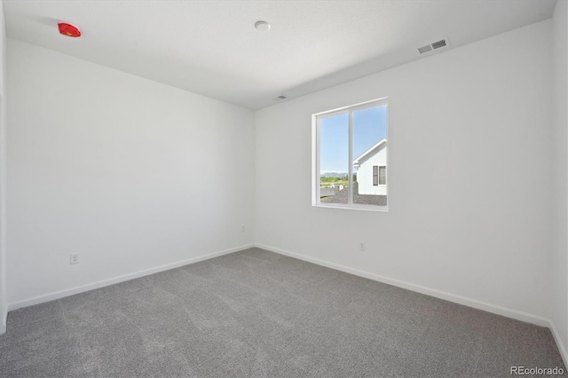 1368 Penner Dr, Erie, CO 80026 - spare room featuring carpet and baseboards