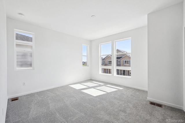 1368 Penner Dr, Erie, CO 80026 - carpeted spare room with baseboards and a smoke detector