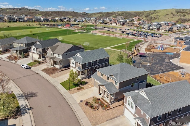 aerial perspective of suburban area with a mountain backdrop