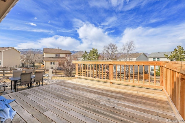 wooden deck featuring a mountain view