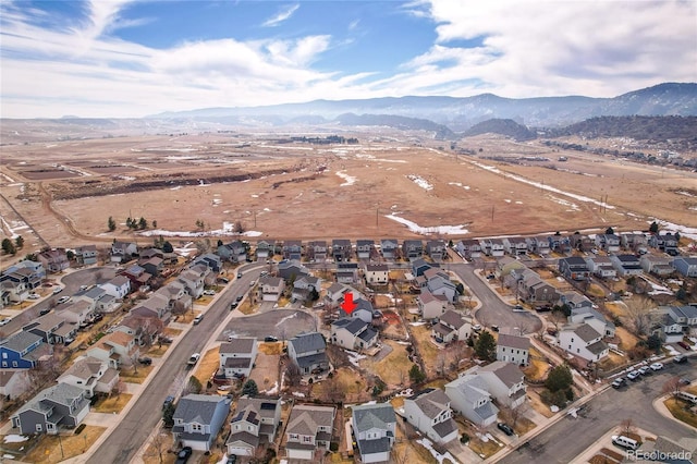 bird's eye view with a mountain view