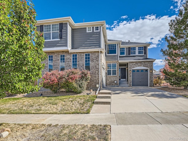 view of front of property with a garage